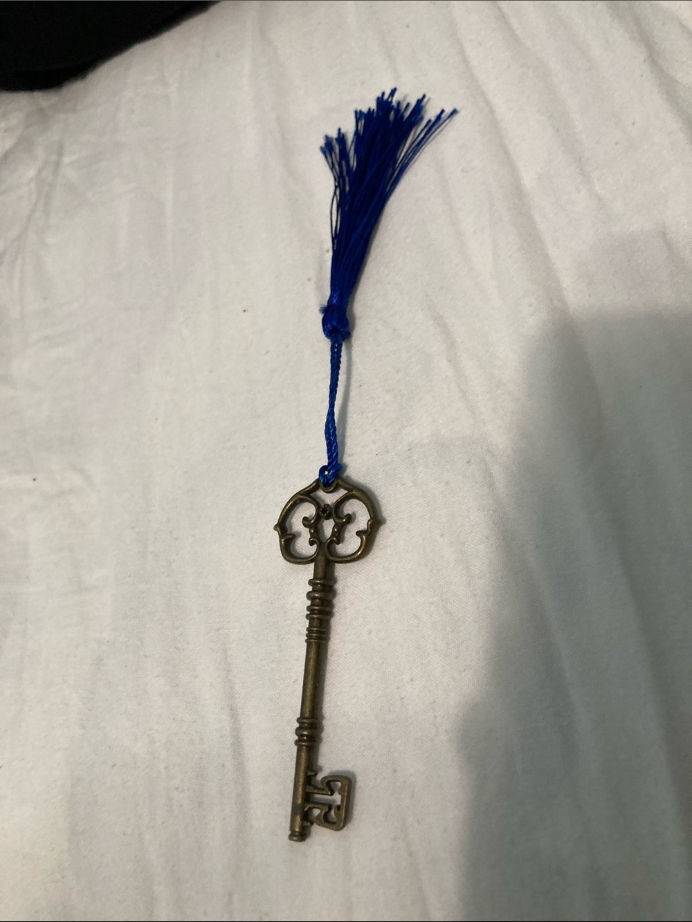Antique-Style Brass Skeleton Key Wall Decor with Blue Tassel